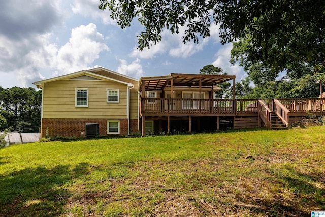 2517 Wright Cir, Birmingham, AL 35235 - rear view of house with a wooden deck and a lawn