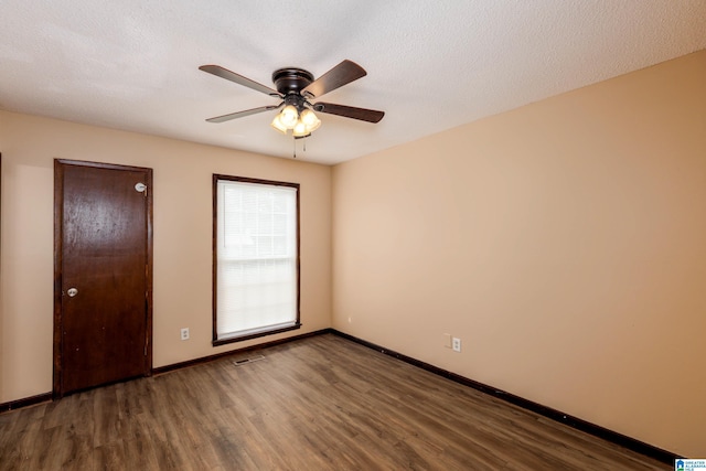 2517 Wright Cir, Birmingham, AL 35235 - unfurnished room featuring wood finished floors and a ceiling fan