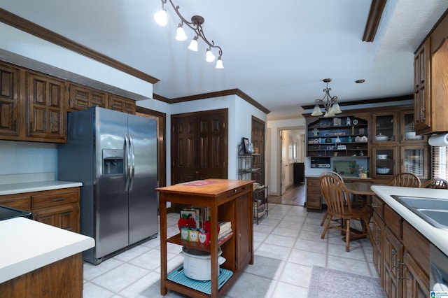 3518 William And Mary Rd, Hoover, AL 35216 - kitchen featuring stainless steel refrigerator with ice dispenser, open shelves, a chandelier, crown molding, and butcher block counters