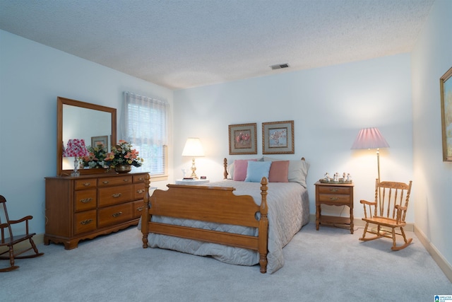 3518 William And Mary Rd, Hoover, AL 35216 - bedroom with light colored carpet and a textured ceiling