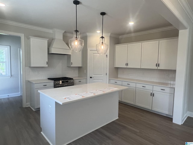 1234 Simms Rdg, Pelham, AL 35124 - kitchen featuring custom exhaust hood, stainless steel range, white cabinetry, dark wood-type flooring, and ornamental molding