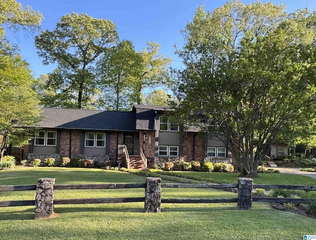 2912 Monte Deste Dr, Hoover, AL 35216 - tri-level home featuring brick siding and a shingled roof