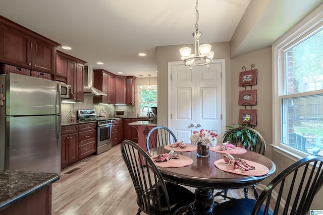 2912 Monte Deste Dr, Hoover, AL 35216 - dining space with a chandelier, light wood finished floors, and recessed lighting