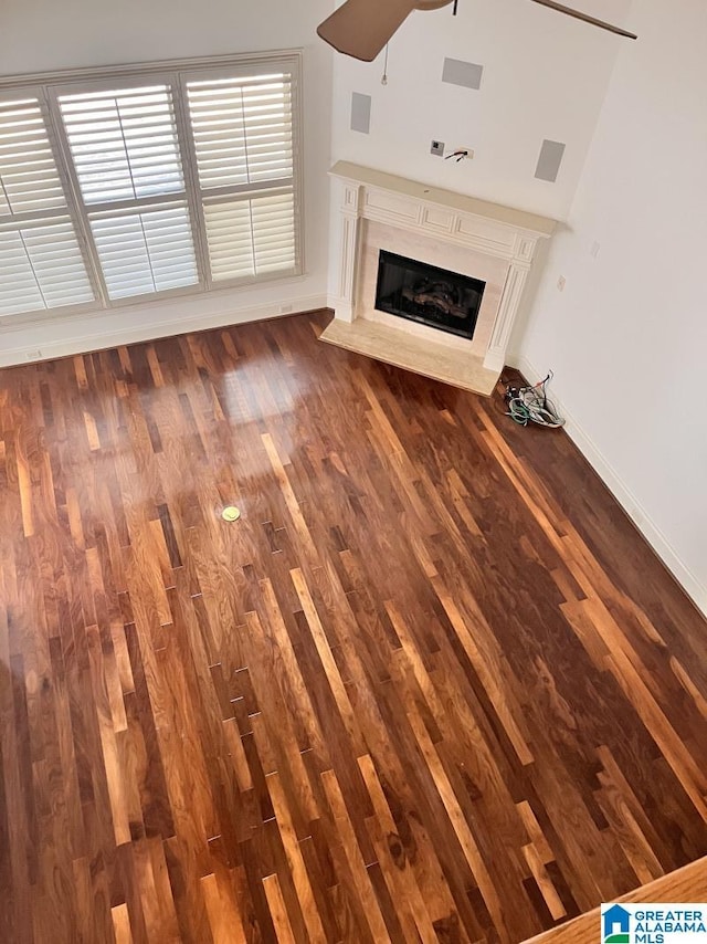 1664 Warren Ln, Vestavia Hills, AL 35243 - unfurnished living room with a ceiling fan, dark wood finished floors, and a high end fireplace