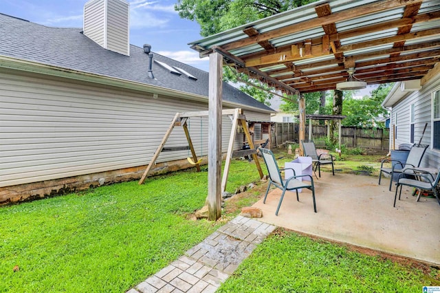 4033 Saddle Run Cir, Pelham, AL 35124 - fenced backyard with a ceiling fan, a patio, and a playground