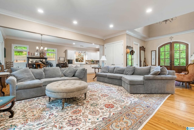 1007 Eagle Hill Dr, Birmingham, AL 35242 - living room featuring a chandelier, plenty of natural light, light wood-style flooring, french doors, and recessed lighting