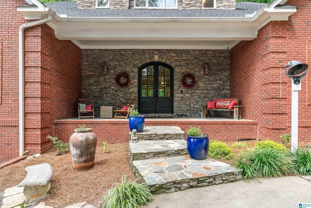 1007 Eagle Hill Dr, Birmingham, AL 35242 - view of exterior entry with french doors, a porch, and roof with shingles