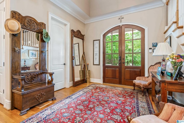 1007 Eagle Hill Dr, Birmingham, AL 35242 - foyer entrance with light wood-style flooring, french doors, and crown molding