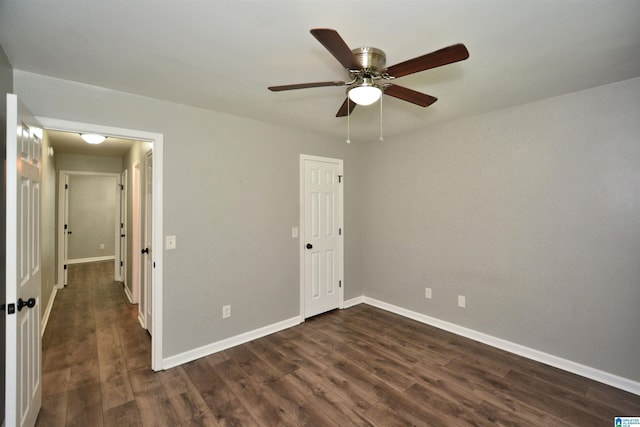 7101 Cavern Rd, Trussville, AL 35173 - unfurnished bedroom with dark wood finished floors and a ceiling fan