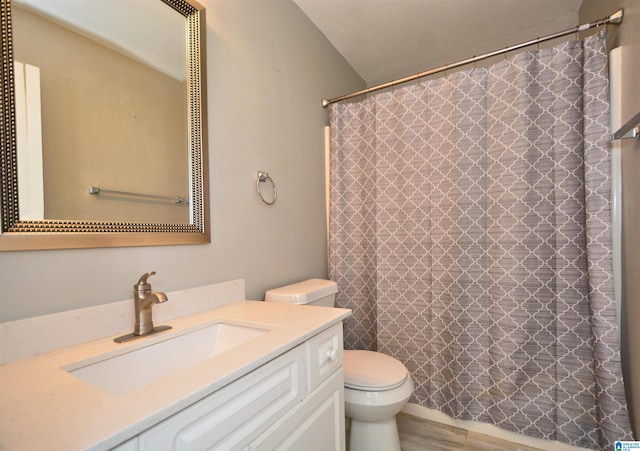 7101 Cavern Rd, Trussville, AL 35173 - bathroom with vanity, lofted ceiling, and a shower with curtain