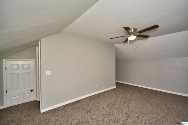 7101 Cavern Rd, Trussville, AL 35173 - additional living space with lofted ceiling, dark colored carpet, and a ceiling fan