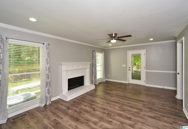 7101 Cavern Rd, Trussville, AL 35173 - unfurnished living room with a ceiling fan, crown molding, recessed lighting, dark wood finished floors, and a brick fireplace