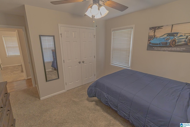 2191 Whiting Rd, Hoover, AL 35216 - carpeted bedroom featuring a closet and a ceiling fan