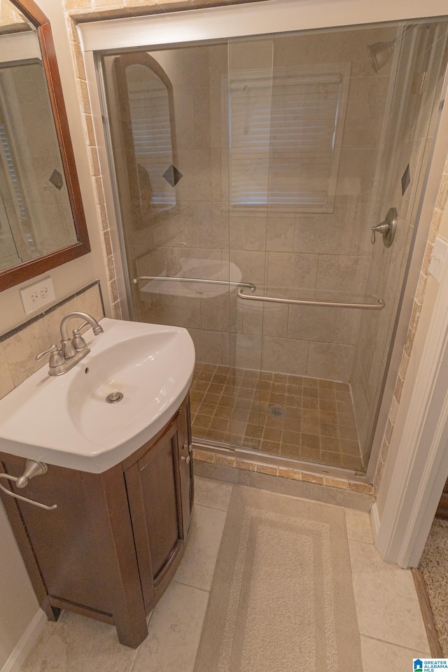 2191 Whiting Rd, Hoover, AL 35216 - full bathroom featuring a shower stall, vanity, and tile patterned flooring