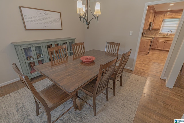 2191 Whiting Rd, Hoover, AL 35216 - dining area with light wood-style floors, a chandelier, and recessed lighting