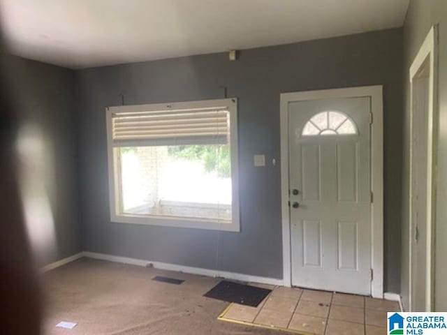 209 61st St, Fairfield, AL 35064 - carpeted foyer entrance with baseboards