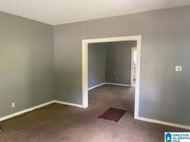 209 61st St, Fairfield, AL 35064 - carpeted spare room with baseboards