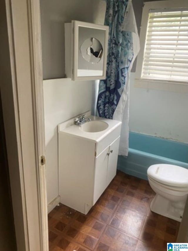 209 61st St, Fairfield, AL 35064 - full bathroom with vanity and shower / bath combo