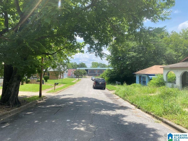209 61st St, Fairfield, AL 35064 - view of asphalt street with curbs