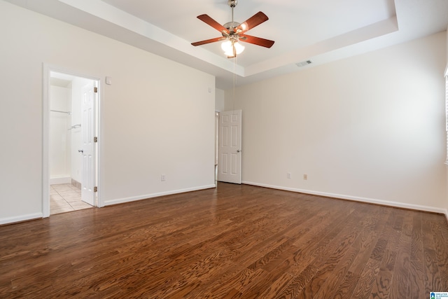 313 Chadwick Pl, Helena, AL 35080 - spare room with a raised ceiling, wood finished floors, and a ceiling fan
