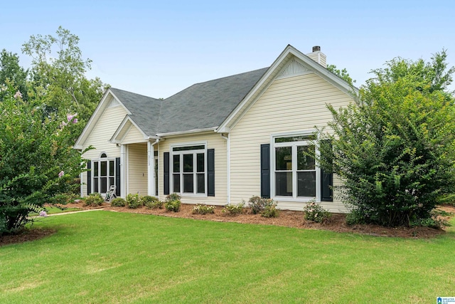 313 Chadwick Pl, Helena, AL 35080 - view of front of property featuring a front lawn, a chimney, and roof with shingles