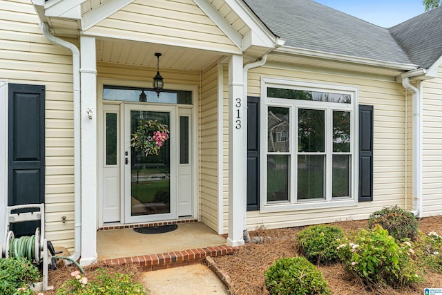 313 Chadwick Pl, Helena, AL 35080 - property entrance with a shingled roof and covered porch
