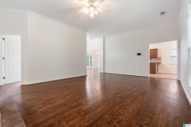 313 Chadwick Pl, Helena, AL 35080 - unfurnished living room featuring ceiling fan, dark wood-type flooring, and ornamental molding