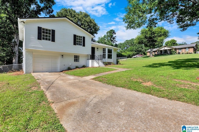 8312 Country Cir, Pinson, AL 35126 - tri-level home featuring brick siding, concrete driveway, and an attached garage