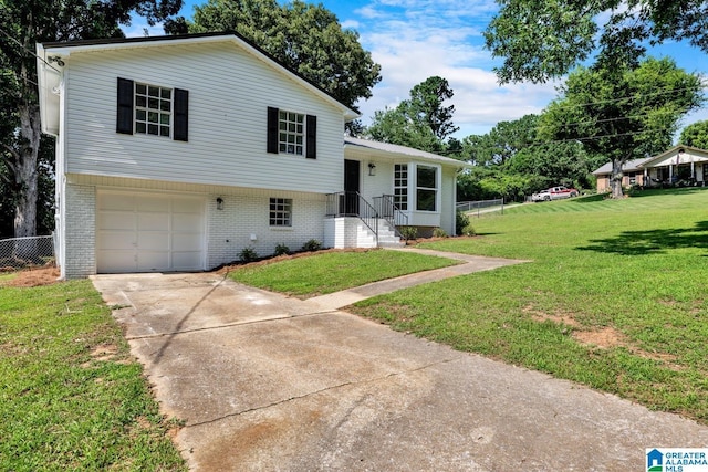 8312 Country Cir, Pinson, AL 35126 - split level home featuring concrete driveway, brick siding, and a garage