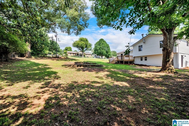 8312 Country Cir, Pinson, AL 35126 - view of yard with a wooden deck