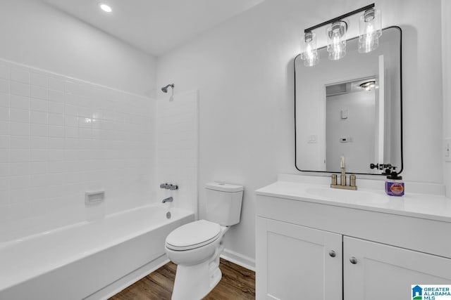 8312 Country Cir, Pinson, AL 35126 - bathroom featuring vanity, wood finished floors, and shower / washtub combination