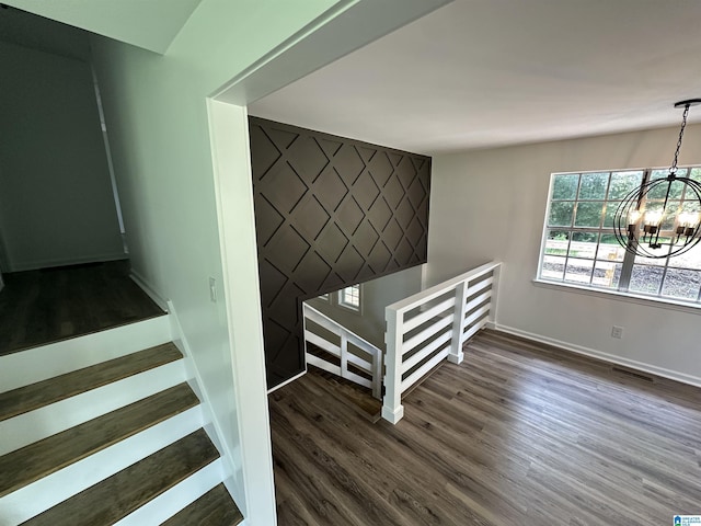 8312 Country Cir, Pinson, AL 35126 - staircase with a chandelier and wood finished floors