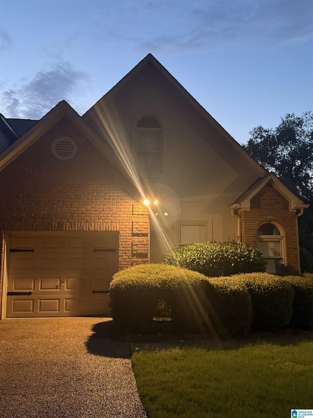 4652 Lake Valley Dr, Hoover, AL 35244 - view of front of property featuring brick siding and a garage