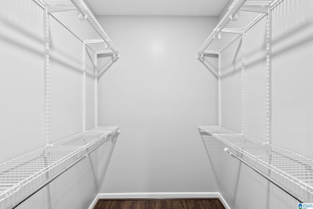 4652 Lake Valley Dr, Hoover, AL 35244 - walk in closet featuring dark wood finished floors