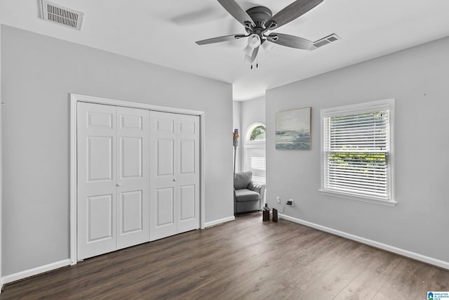 4652 Lake Valley Dr, Hoover, AL 35244 - bedroom featuring dark wood-style floors, a closet, and a ceiling fan