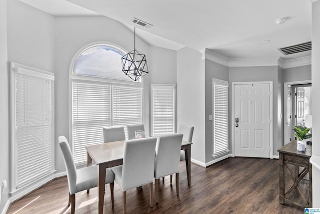 4652 Lake Valley Dr, Hoover, AL 35244 - dining room featuring dark wood finished floors, a chandelier, and ornamental molding