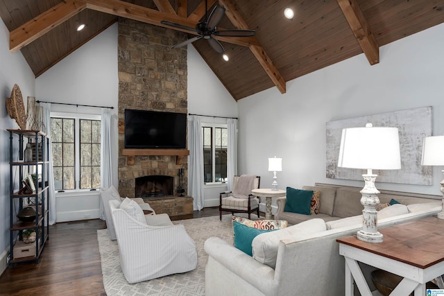 6902 Honor Keith Rd, Trussville, AL 35173 - living area with a wood ceiling with exposed beams, wood finished floors, a ceiling fan, high vaulted ceiling, and a stone fireplace
