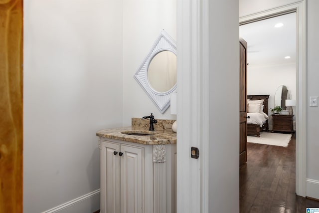 6902 Honor Keith Rd, Trussville, AL 35173 - bathroom with wood finished floors, vanity, and recessed lighting