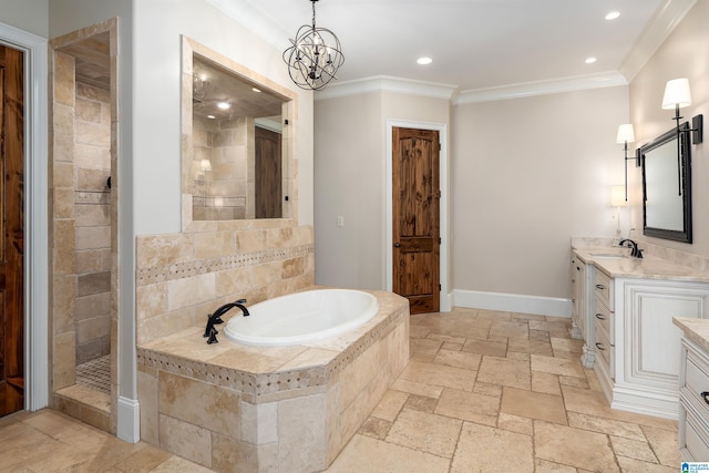 6902 Honor Keith Rd, Trussville, AL 35173 - full bath featuring vanity, a garden tub, ornamental molding, recessed lighting, and a chandelier