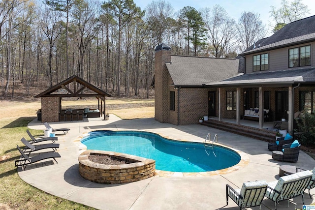 6902 Honor Keith Rd, Trussville, AL 35173 - swimming pool featuring a patio, a gazebo, and an outdoor living space with a fire pit