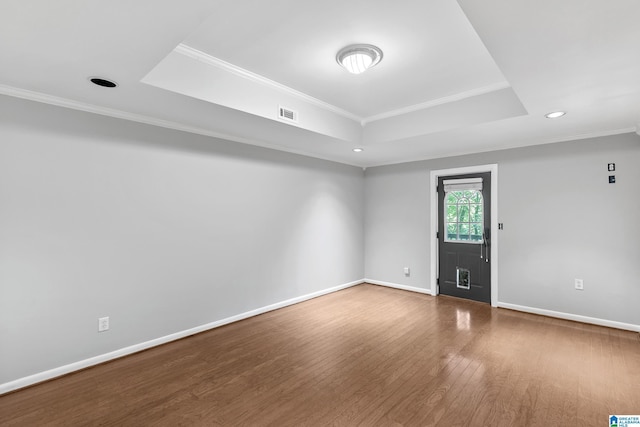 5521 Magnolia Trce, Hoover, AL 35244 - unfurnished room featuring a raised ceiling, wood finished floors, recessed lighting, and crown molding