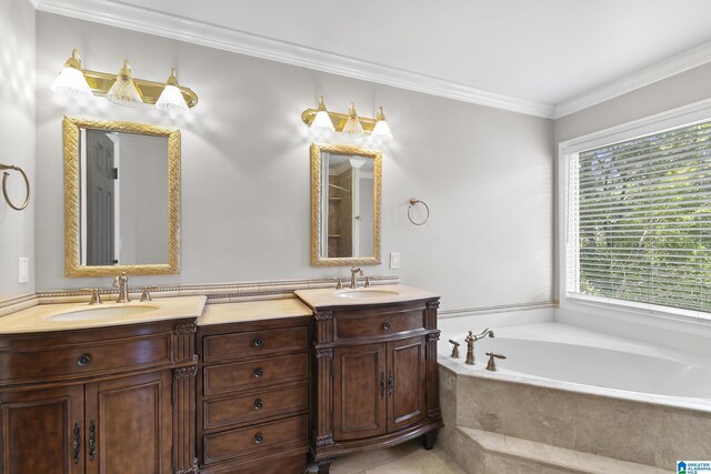 5521 Magnolia Trce, Hoover, AL 35244 - bathroom with double vanity, a garden tub, and ornamental molding