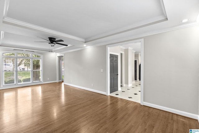 5521 Magnolia Trce, Hoover, AL 35244 - unfurnished room with crown molding, a tray ceiling, wood finished floors, ceiling fan, and recessed lighting