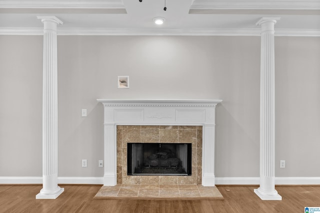 5521 Magnolia Trce, Hoover, AL 35244 - detailed view of wood finished floors, a tiled fireplace, and crown molding