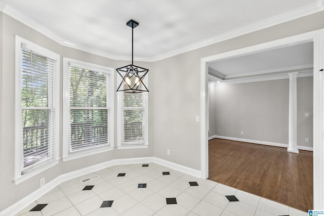 5521 Magnolia Trce, Hoover, AL 35244 - unfurnished dining area with crown molding and tile patterned floors