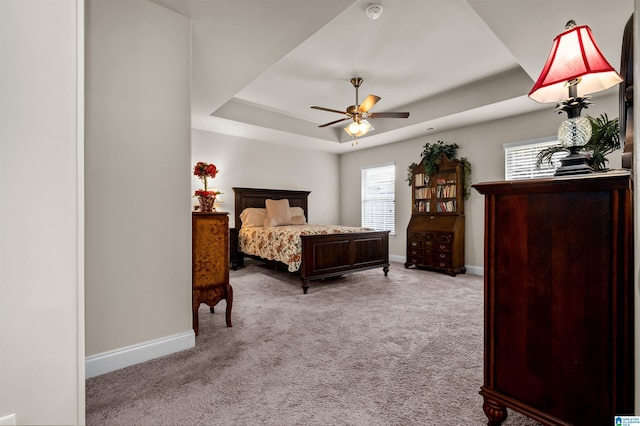 143 Hidden Trace Ct, Montevallo, AL 35115 - carpeted bedroom with a tray ceiling and ceiling fan