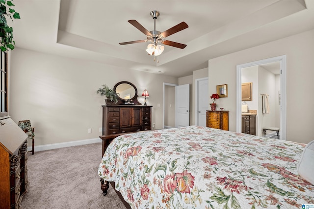 143 Hidden Trace Ct, Montevallo, AL 35115 - bedroom featuring carpet floors, a tray ceiling, ensuite bathroom, and ceiling fan