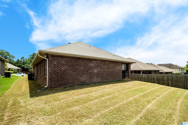 143 Hidden Trace Ct, Montevallo, AL 35115 - rear view of house featuring brick siding and roof with shingles