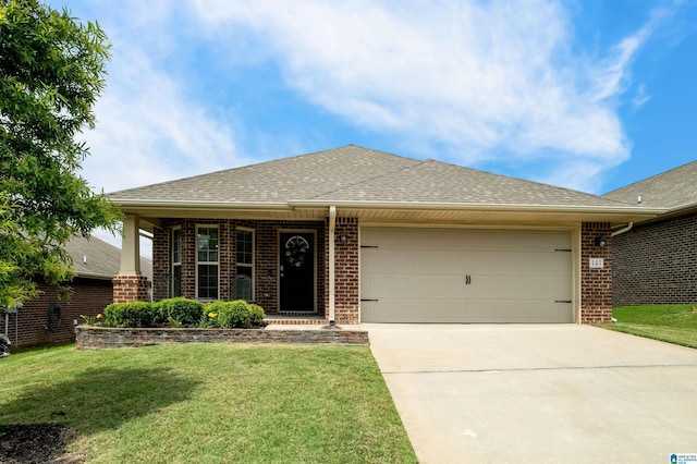 143 Hidden Trace Ct, Montevallo, AL 35115 - ranch-style home featuring brick siding, driveway, a front lawn, roof with shingles, and an attached garage
