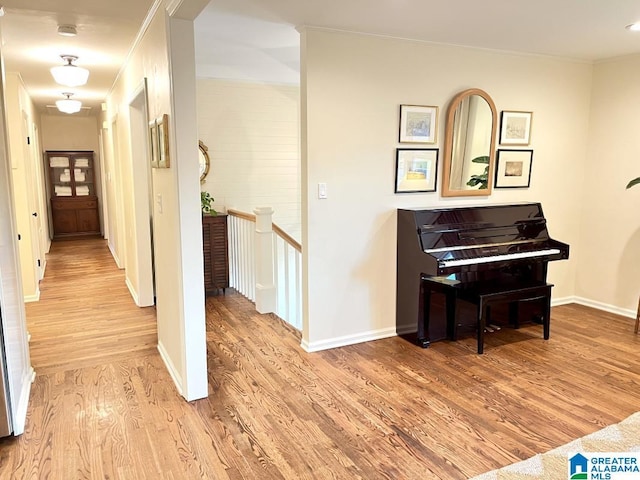 2713 Altadena Lake Rd, Birmingham, AL 35243 - hall featuring an upstairs landing, light wood-style floors, and ornamental molding